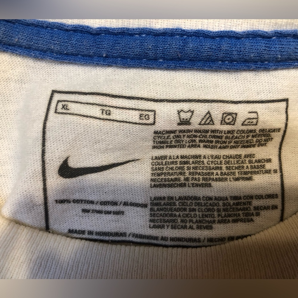 Nike White T-Shirt with Blue Neck Trim and Blue and orange trim Nike Logo - Picture 9 of 10